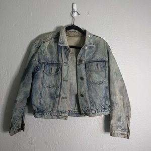 Distressed denim jacket